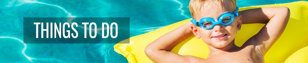 Boy relaxing on inner tube